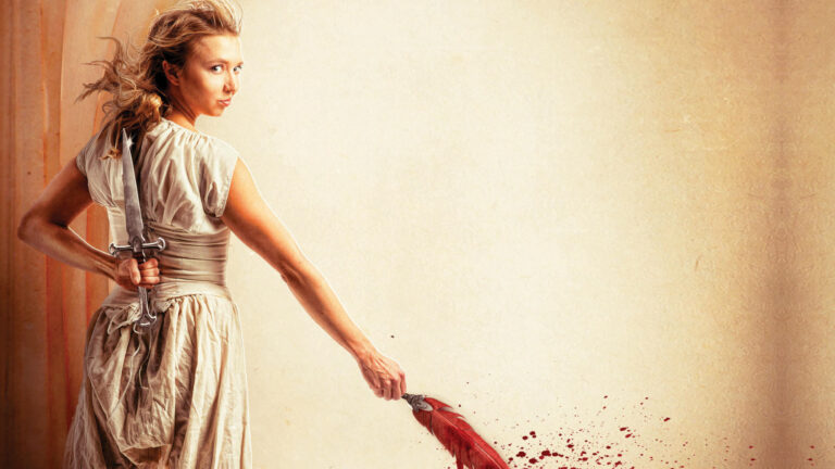 Juliet holds a red feather dripping with blood
